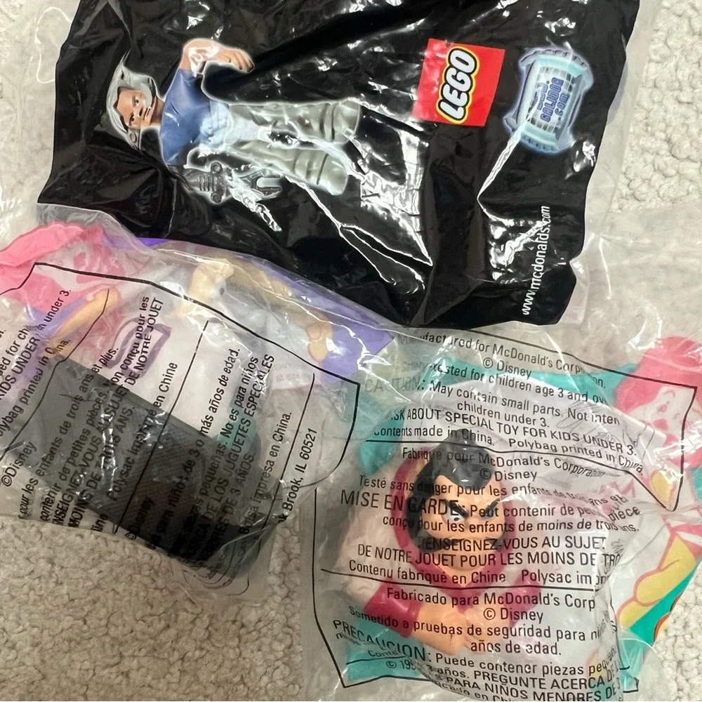 Three Sealed McDonald’s Happy Meal Toys